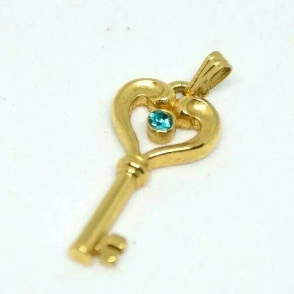 Avon Blue Green Rhinestone Gold Tone Key Pendant